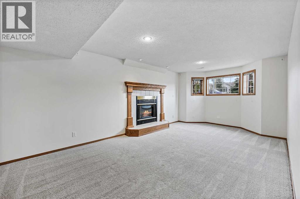 87 Quigley Drive, Cochrane, Alberta  T4C 1L5 - Photo 22 - A2261383