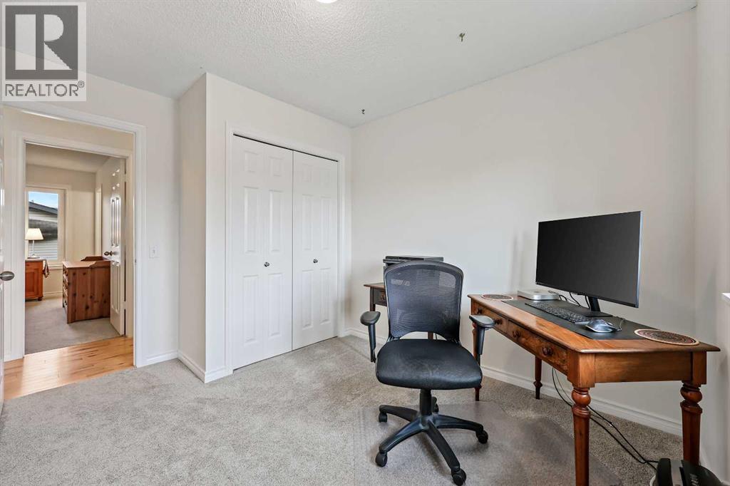 87 Quigley Drive, Cochrane, Alberta  T4C 1L5 - Photo 19 - A2261383