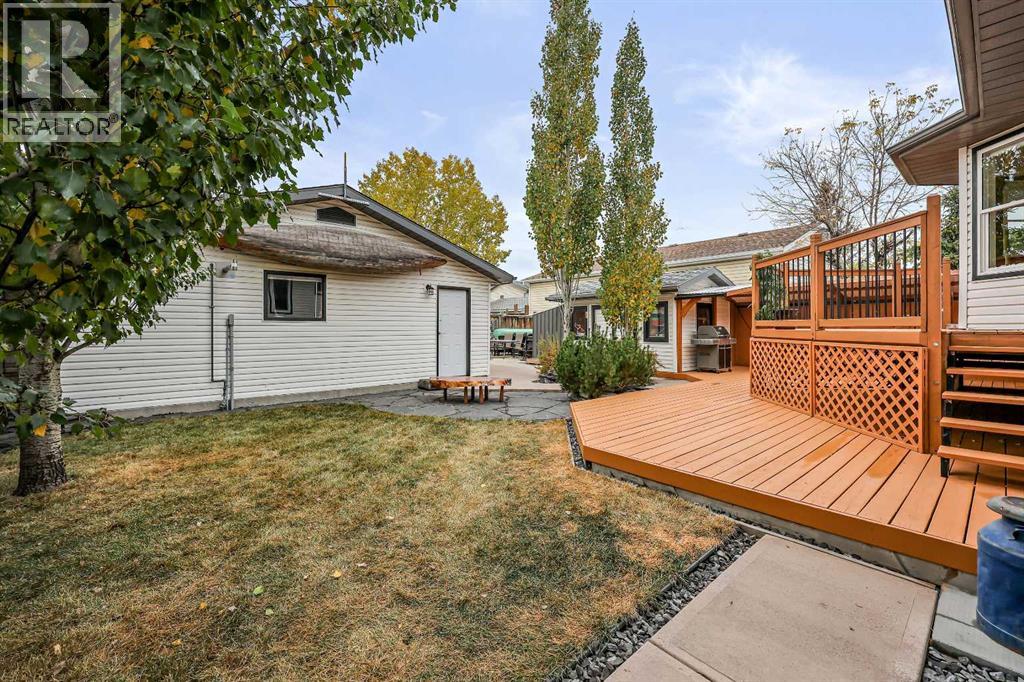 87 Quigley Drive, Cochrane, Alberta  T4C 1L5 - Photo 34 - A2261383