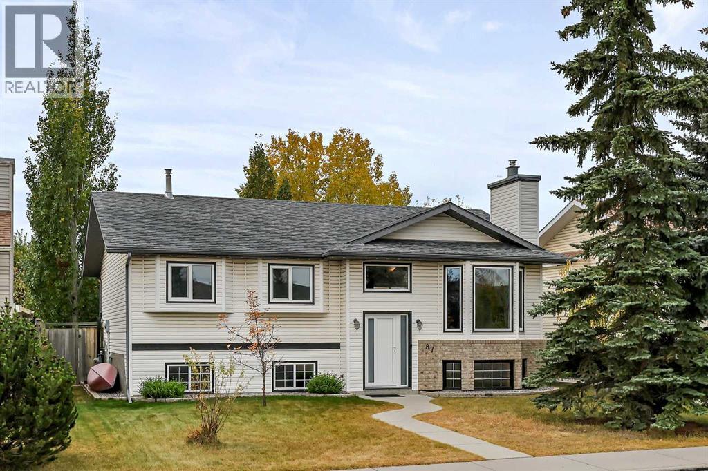87 Quigley Drive, Cochrane, Alberta  T4C 1L5 - Photo 1 - A2261383