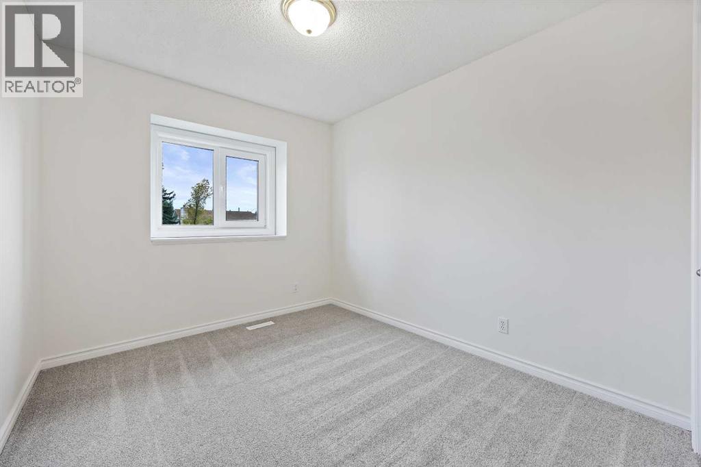 87 Quigley Drive, Cochrane, Alberta  T4C 1L5 - Photo 16 - A2261383