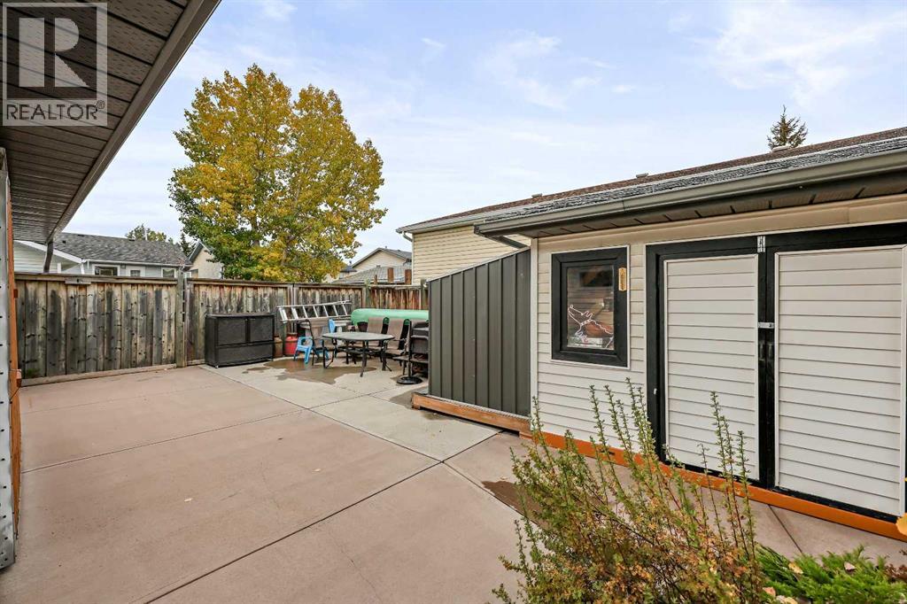 87 Quigley Drive, Cochrane, Alberta  T4C 1L5 - Photo 37 - A2261383