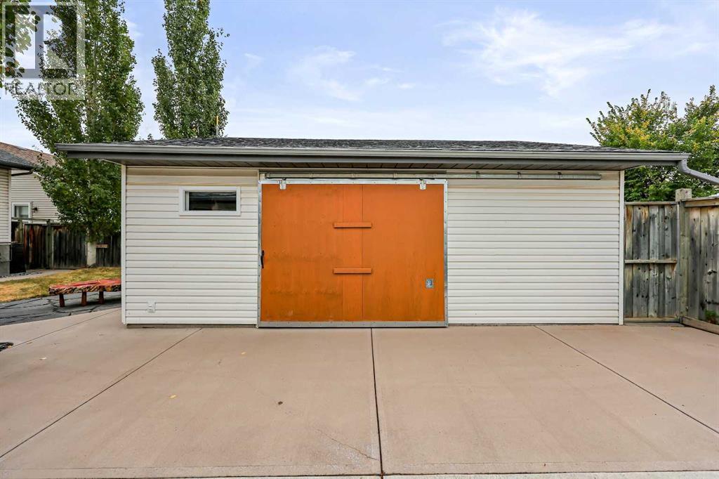87 Quigley Drive, Cochrane, Alberta  T4C 1L5 - Photo 39 - A2261383
