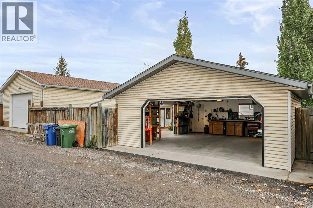 87 Quigley Drive, Cochrane, Alberta  T4C 1L5 - Photo 43 - A2261383