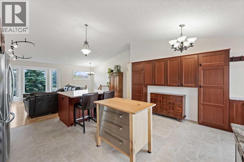 87 Quigley Drive, Cochrane, Alberta  T4C 1L5 - Photo 10 - A2261383