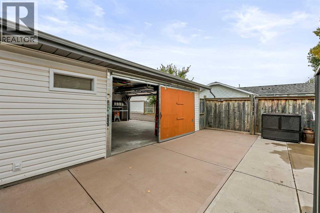 87 Quigley Drive, Cochrane, Alberta  T4C 1L5 - Photo 40 - A2261383
