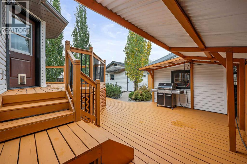 87 Quigley Drive, Cochrane, Alberta  T4C 1L5 - Photo 32 - A2261383