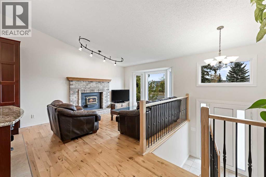 87 Quigley Drive, Cochrane, Alberta  T4C 1L5 - Photo 3 - A2261383