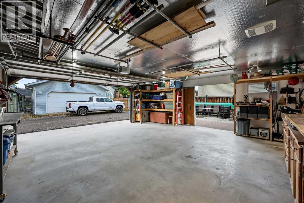87 Quigley Drive, Cochrane, Alberta  T4C 1L5 - Photo 42 - A2261383