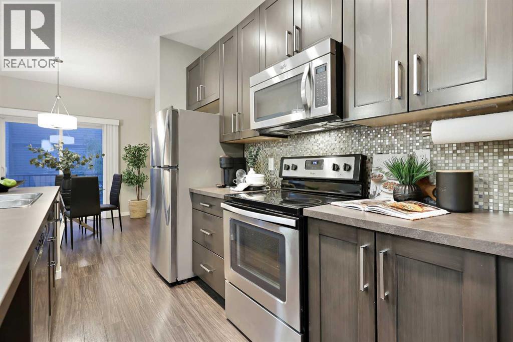 174 Copperpond Villas Se, Calgary, Alberta  T2Z 5B8 - Photo 6 - A2261881