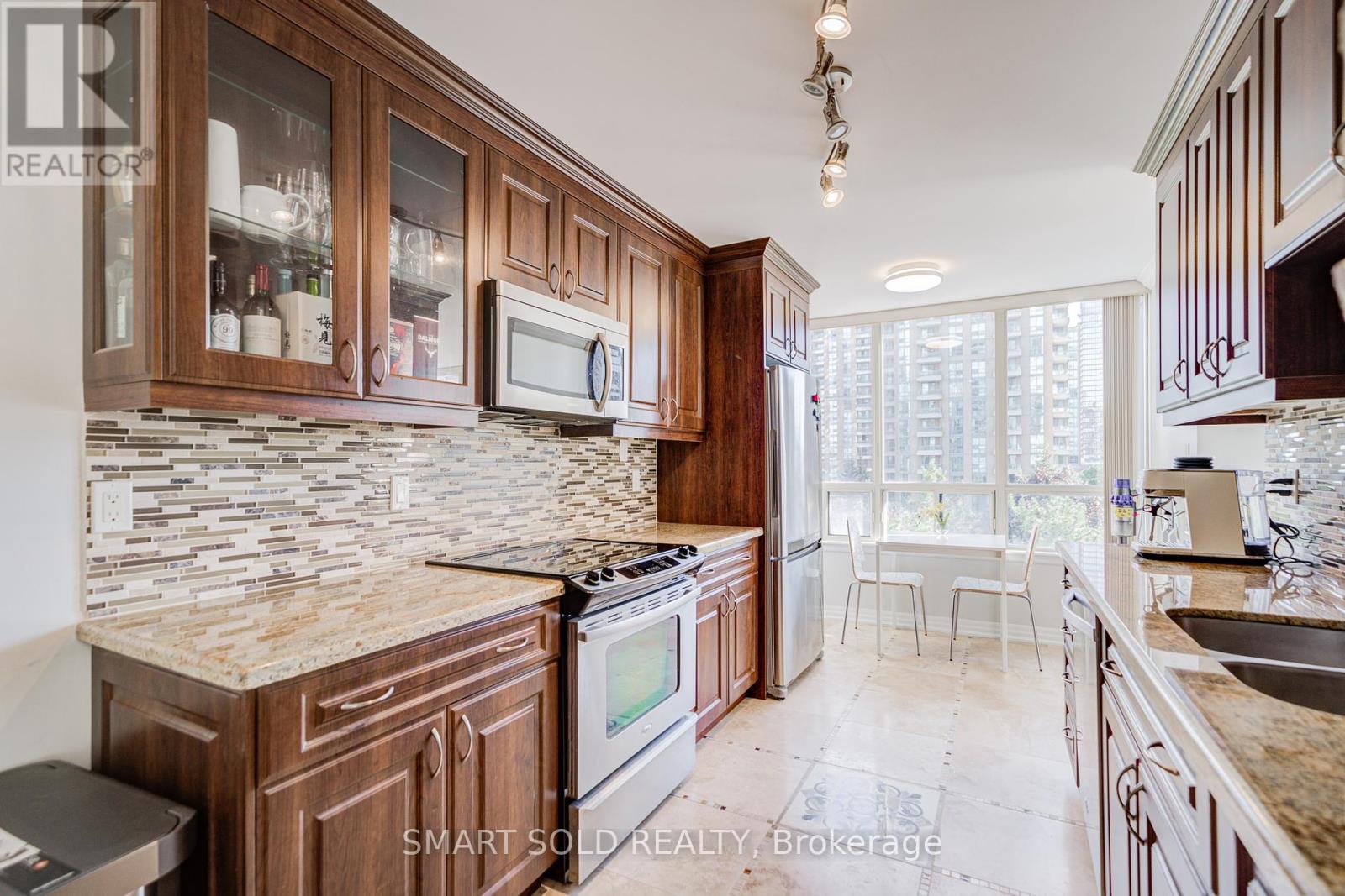 516 - 7 Bishop Avenue, Toronto (Newtonbrook East), Ontario  M2M 4J4 - Photo 11 - C12441986
