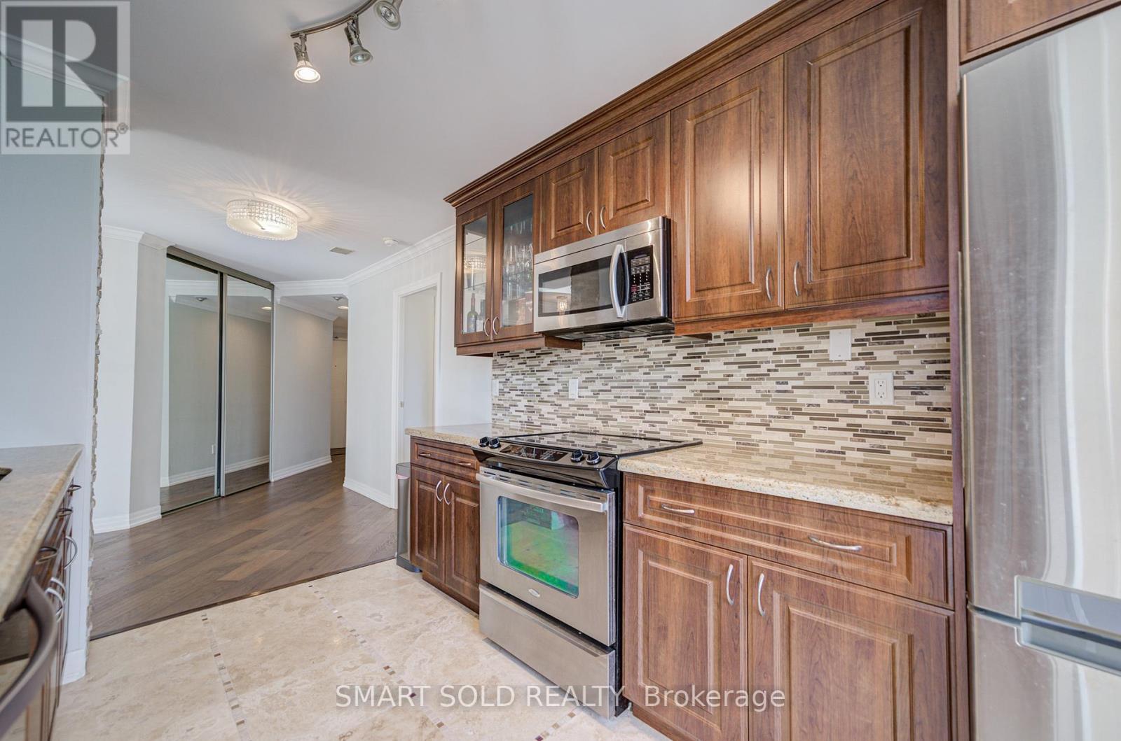 516 - 7 Bishop Avenue, Toronto (Newtonbrook East), Ontario  M2M 4J4 - Photo 12 - C12441986
