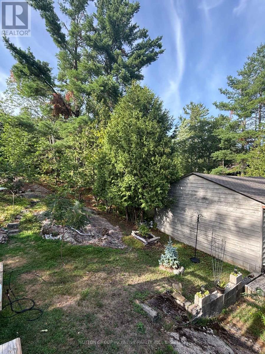 1169 North Kahshe Lake Road, Gravenhurst (Morrison), Ontario  P0E 1G0 - Photo 11 - X12442127