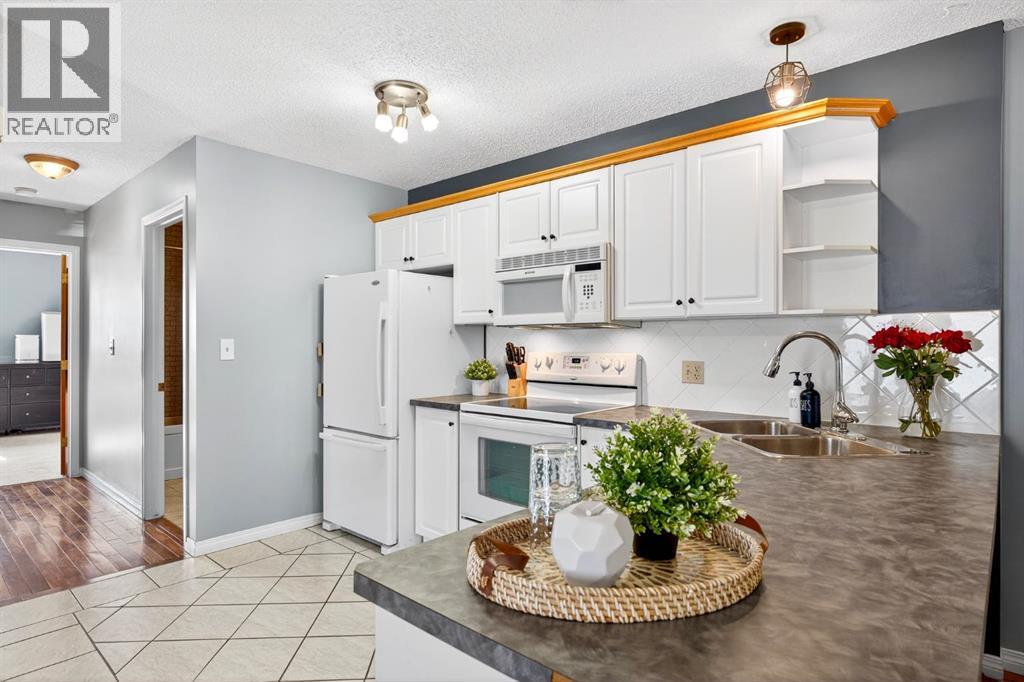 51 Ross Place, Crossfield, Alberta  T0M 0S0 - Photo 10 - A2258551