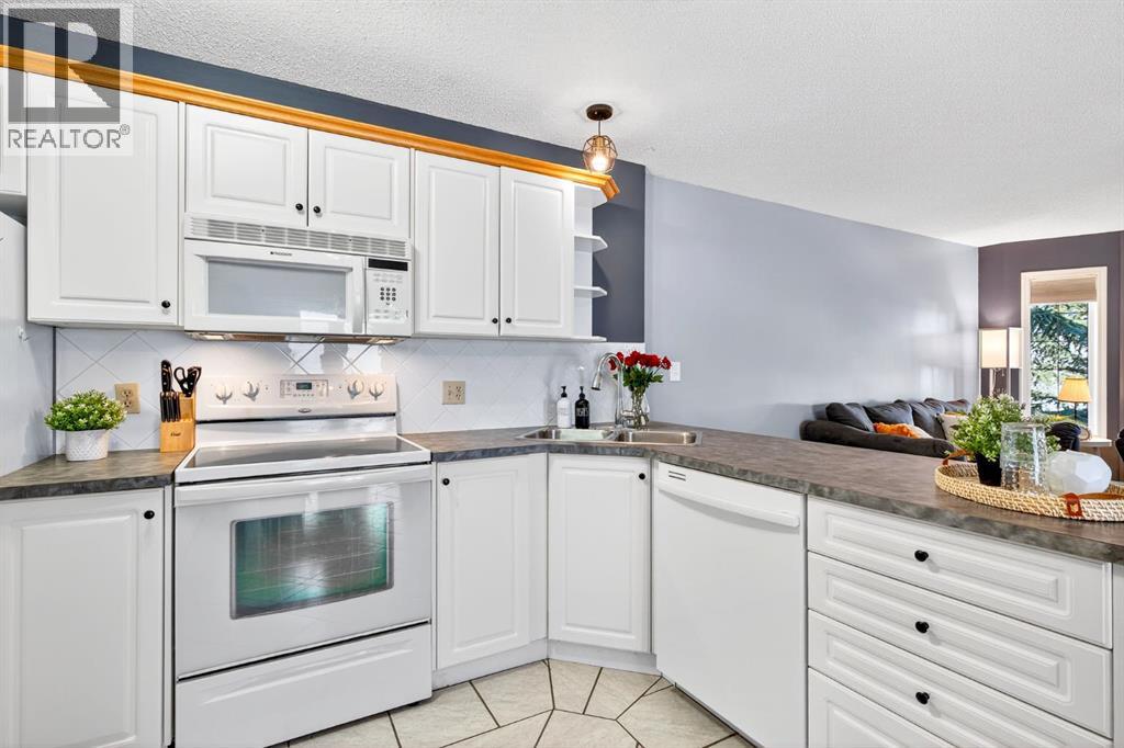 51 Ross Place, Crossfield, Alberta  T0M 0S0 - Photo 9 - A2258551