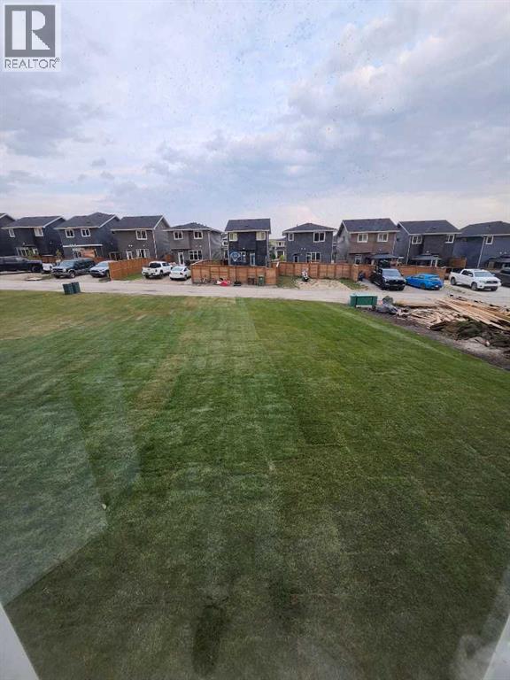 112 Sundown Crescent, Cochrane, Alberta  T4C 1Y3 - Photo 2 - A2243429