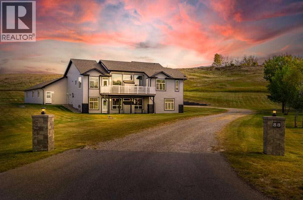 88 Sharp Hill Drive, Rural Rocky View County, Alberta  T4A 0P4 - Photo 1 - A2259077