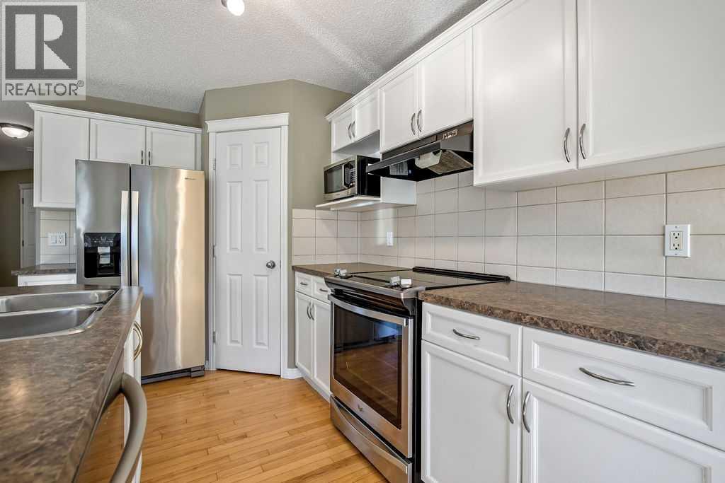 275 Cougar Plateau Way Sw, Calgary, Alberta  T3H 5S2 - Photo 7 - A2251412