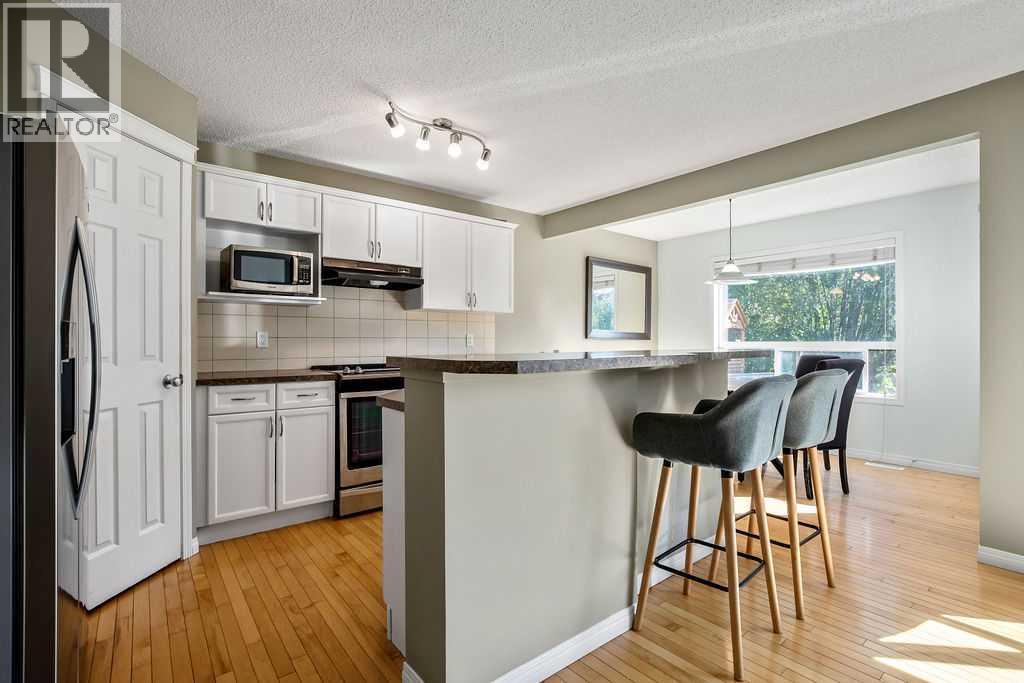 275 Cougar Plateau Way Sw, Calgary, Alberta  T3H 5S2 - Photo 6 - A2251412