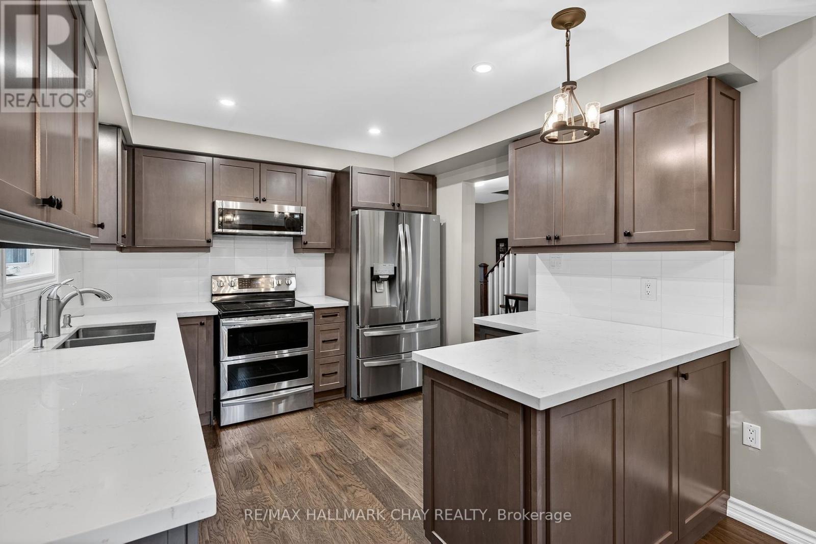 53 Mcknight Crescent, New Tecumseth (Tottenham), Ontario  L0G 1W0 - Photo 5 - N12442312