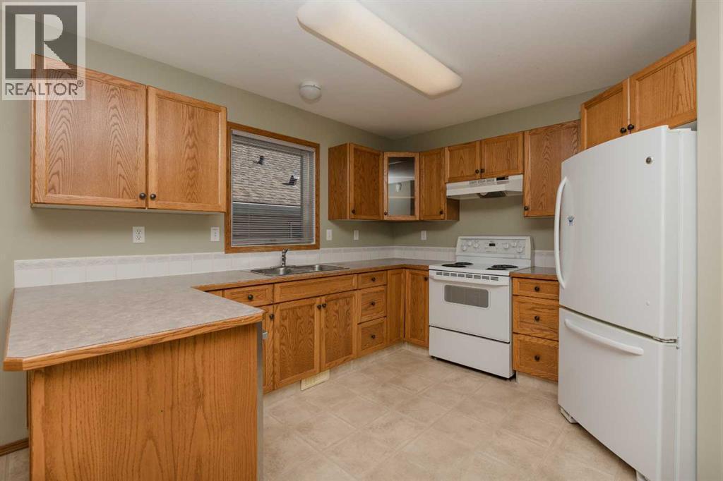 173 Kingston Drive, Red Deer, Alberta  T4P 3V4 - Photo 3 - A2261476
