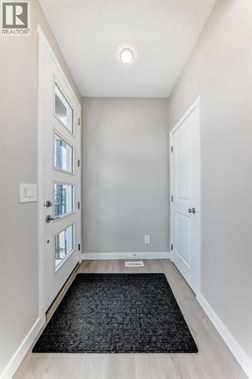 157 Belmont Drive Sw, Calgary, Alberta  T2X 5A1 - Photo 5 - A2259951