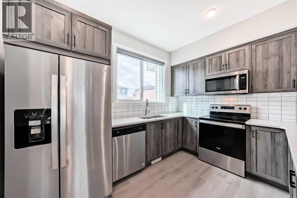 157 Belmont Drive Sw, Calgary, Alberta  T2X 5A1 - Photo 7 - A2259951