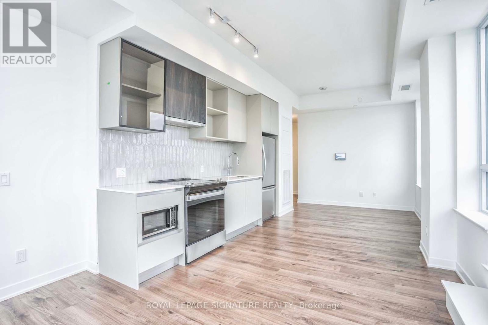 310 - 405 Dundas Street W, Oakville, Ontario  L6M 5P9 - Photo 9 - W12442428
