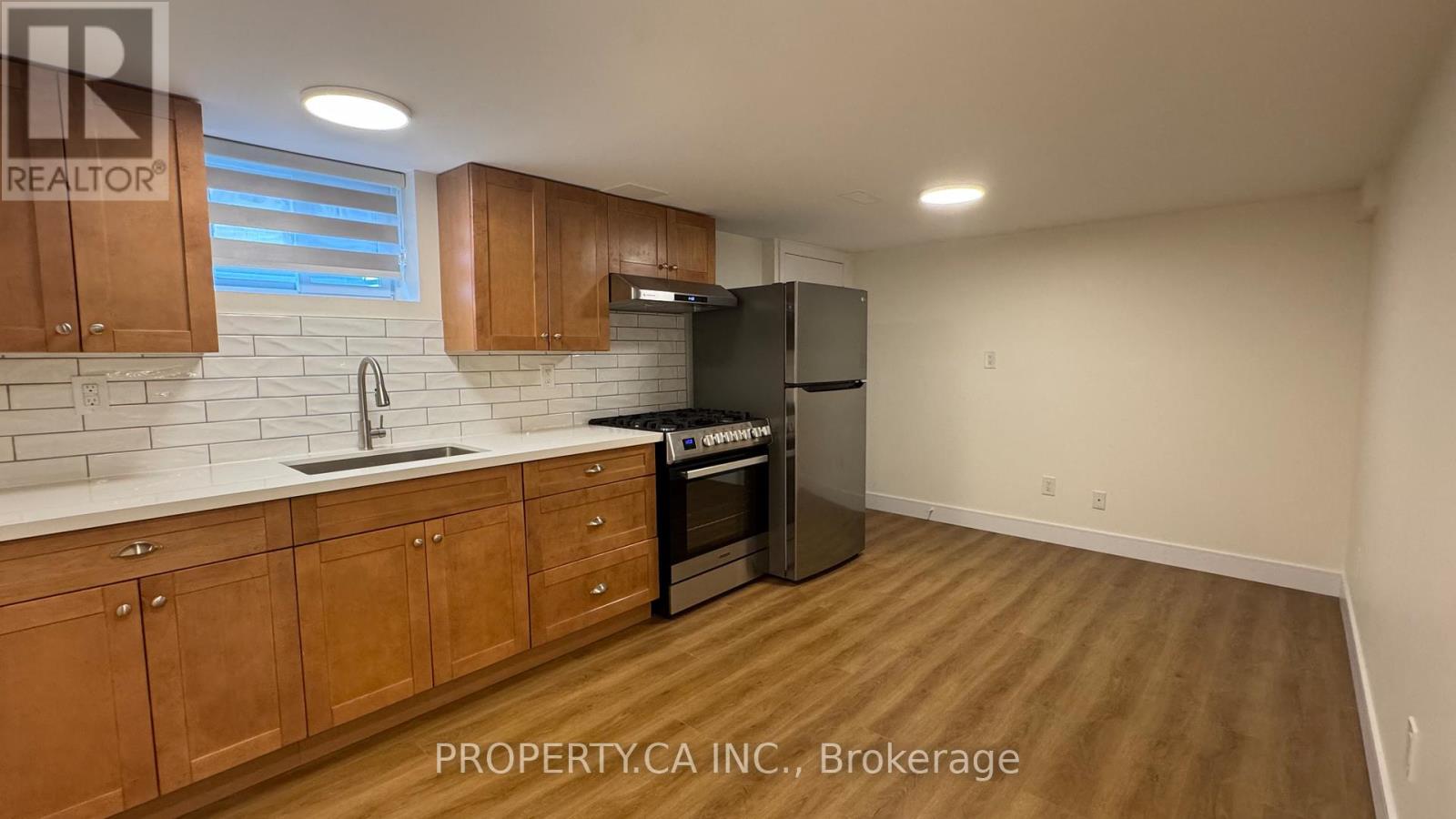 Lower 2 - 60 Lightwood Drive, Toronto, Ontario  M9V 2Z2 - Photo 1 - W12442444