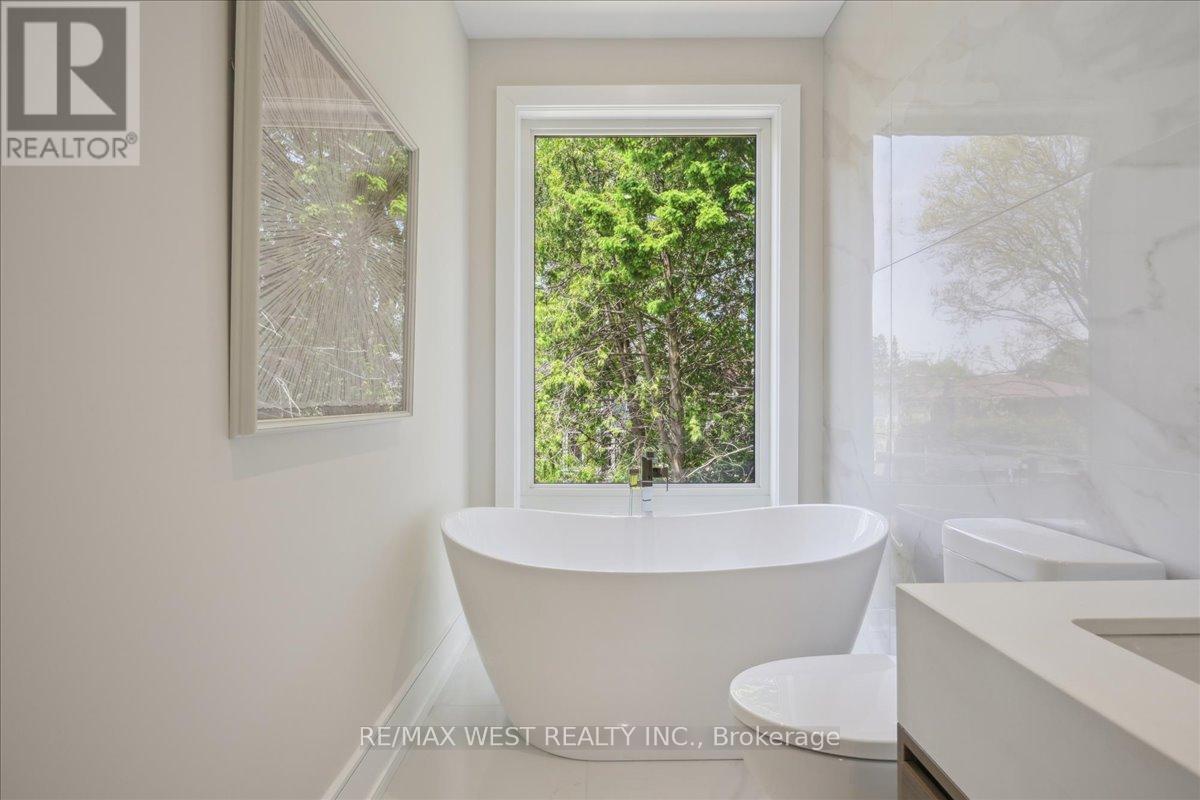 12a Foch Avenue, Toronto (Alderwood), Ontario  M8W 3X1 - Photo 7 - W12442471