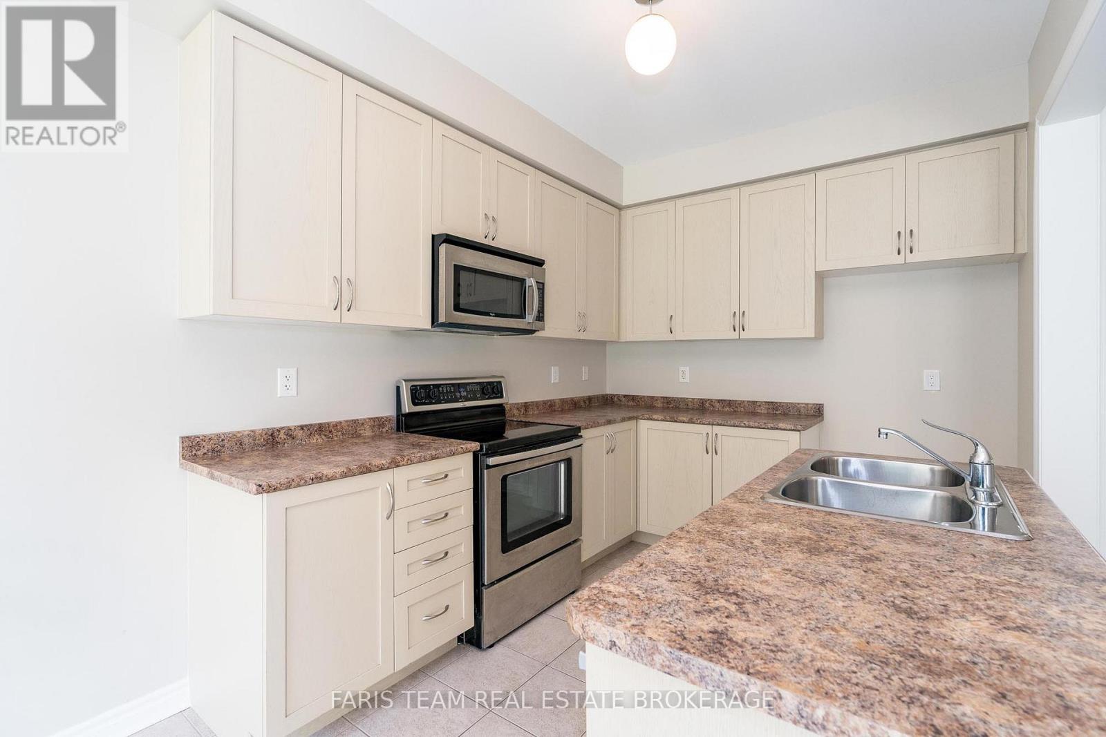 103 Collier Crescent, Essa (Angus), Ontario  L3W 0M8 - Photo 6 - N12442553