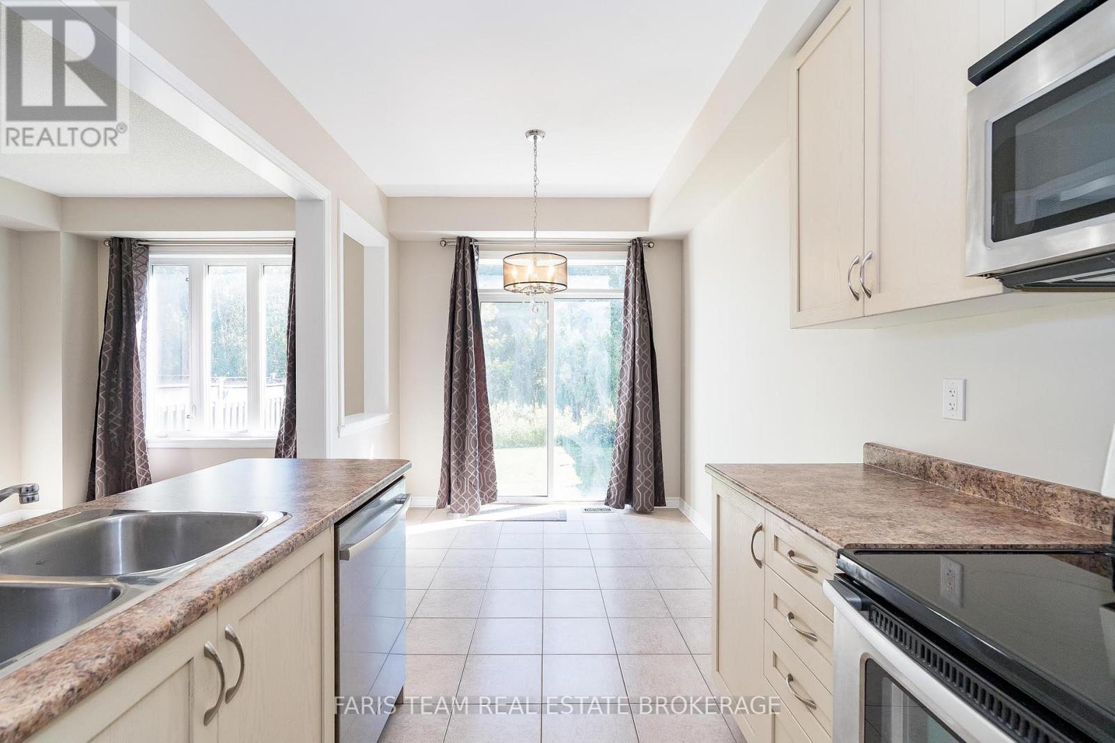 103 Collier Crescent, Essa (Angus), Ontario  L3W 0M8 - Photo 8 - N12442553