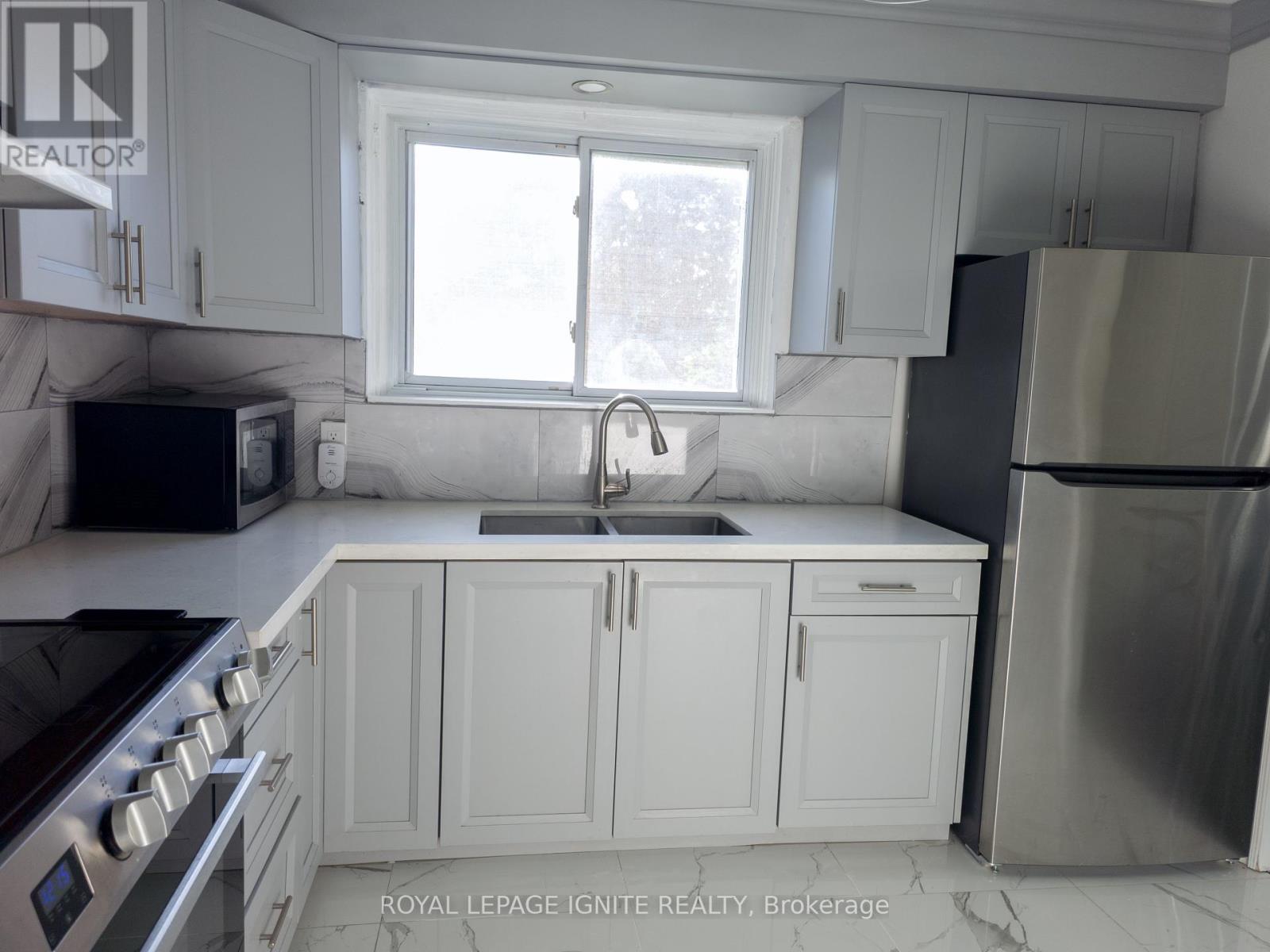 32 - 23 Tealham Drive, Toronto (West Humber-Clairville), Ontario  M9V 3T5 - Photo 6 - W12442641