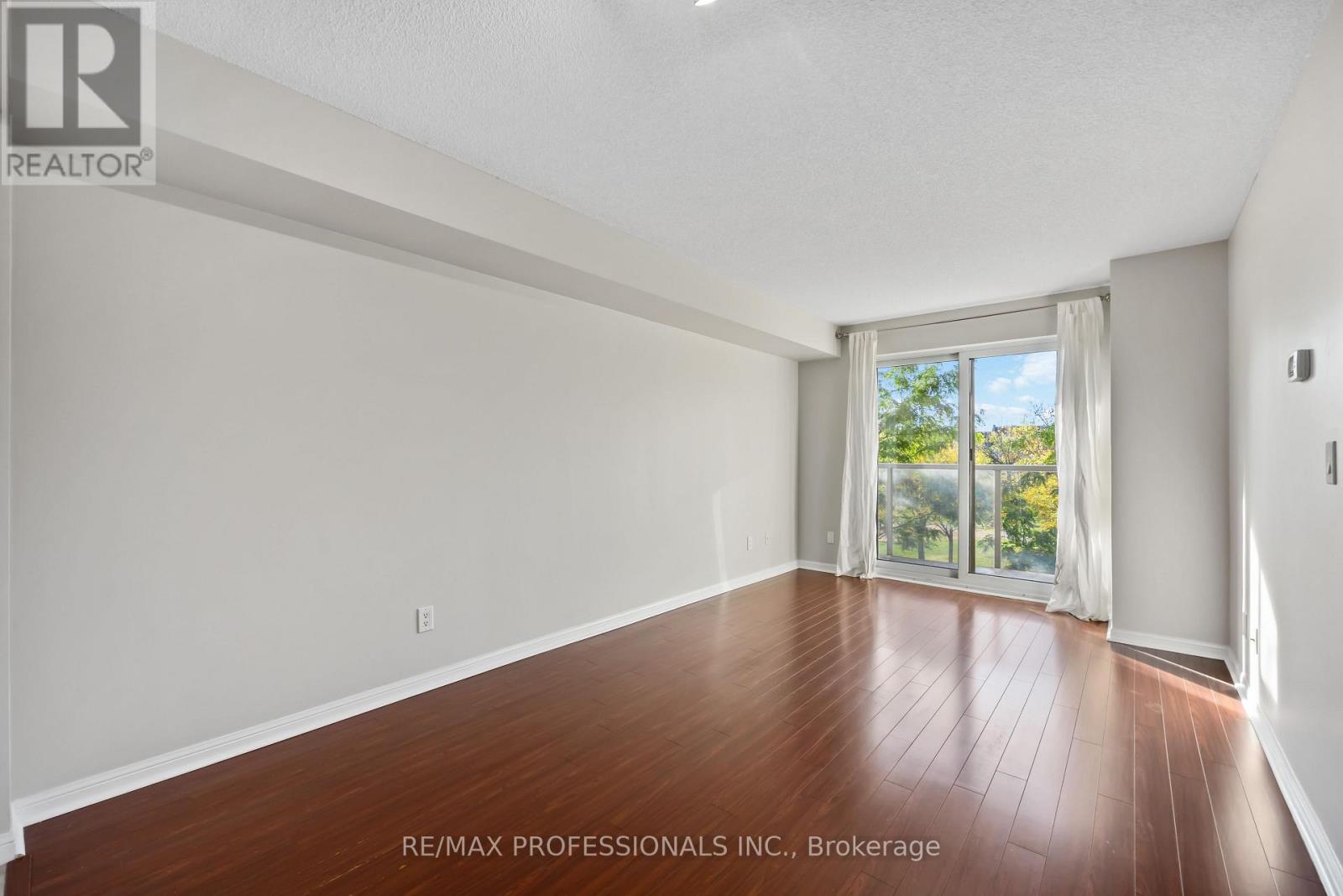 208 - 4 Elsinore Path, Toronto, Ontario  M8V 4G7 - Photo 11 - W12438785