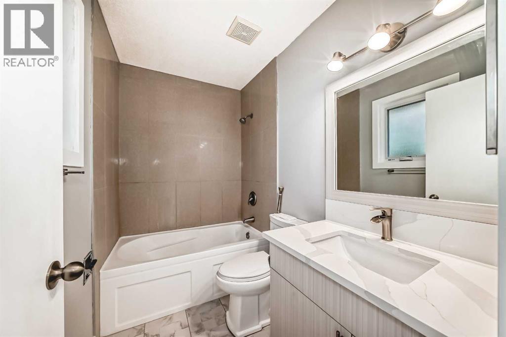 656 Woodbine Boulevard Sw, Calgary, Alberta  T2W 4W4 - Photo 24 - A2261153