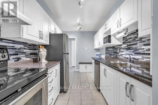 1004 - 44 Longbourne Drive, Toronto (Willowridge-Martingrove-Richview), Ontario  M9R 2M7 - Photo 11 - W12442821