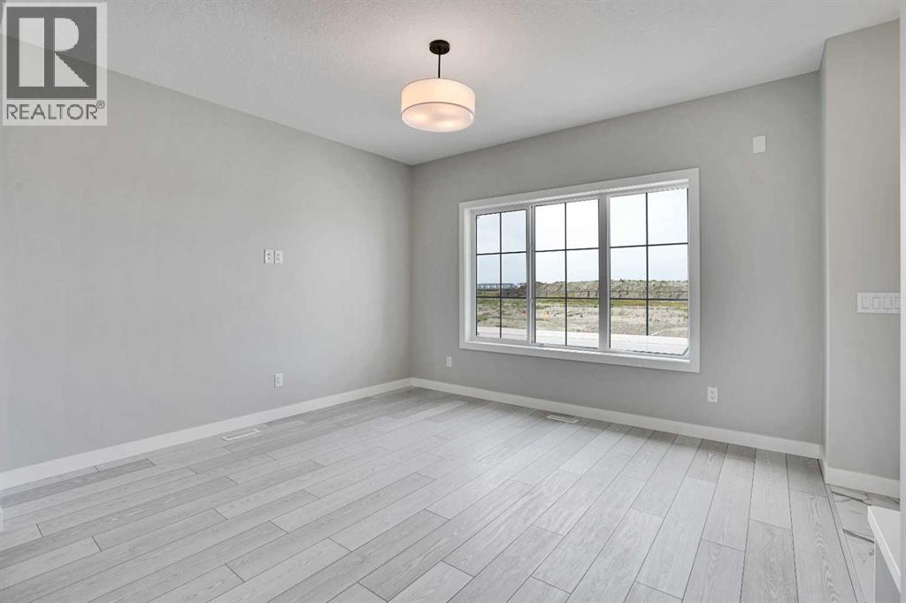 108 Bridgeport Green, Chestermere, Alberta  T1X 3C9 - Photo 3 - A2253734