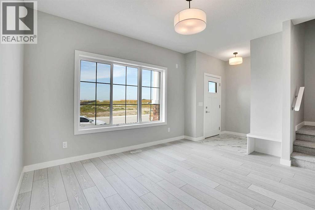108 Bridgeport Green, Chestermere, Alberta  T1X 3C9 - Photo 4 - A2253734