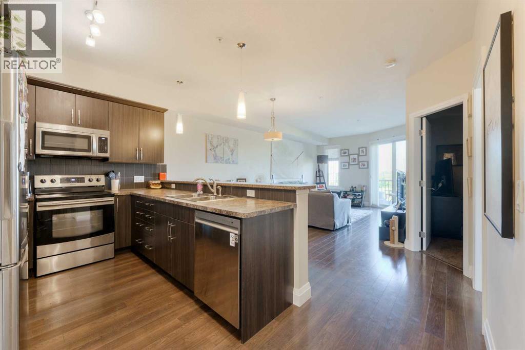 2105, 15 Sunset Square, Cochrane, Alberta  T4C 0E7 - Photo 1 - A2253678