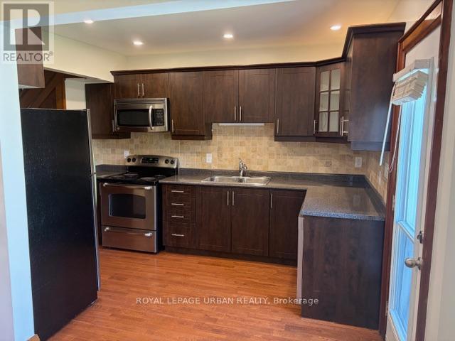Main Floor - 145 Dewhurst Boulevard, Toronto, Ontario  M4J 3K1 - Photo 12 - E12442850