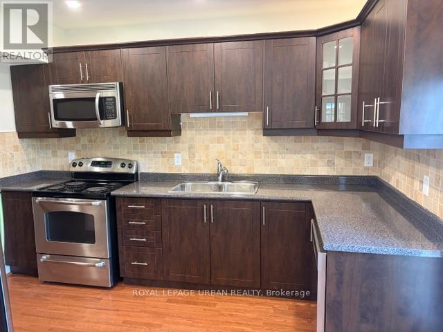 Main Floor - 145 Dewhurst Boulevard, Toronto, Ontario  M4J 3K1 - Photo 15 - E12442850