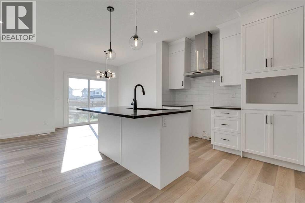 52 Dawson Wharf Mount, Chestermere, Alberta  T1X 2X5 - Photo 6 - A2261800