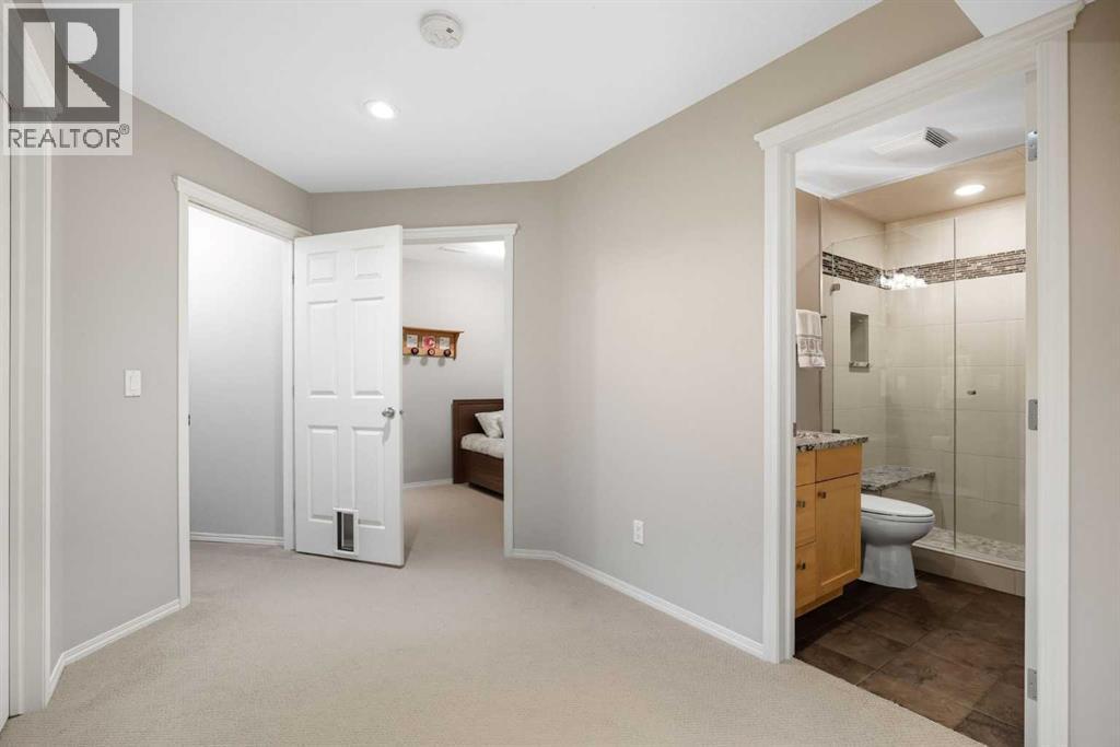 703 Tuscany Drive Nw, Calgary, Alberta  T3L 3A7 - Photo 25 - A2257755