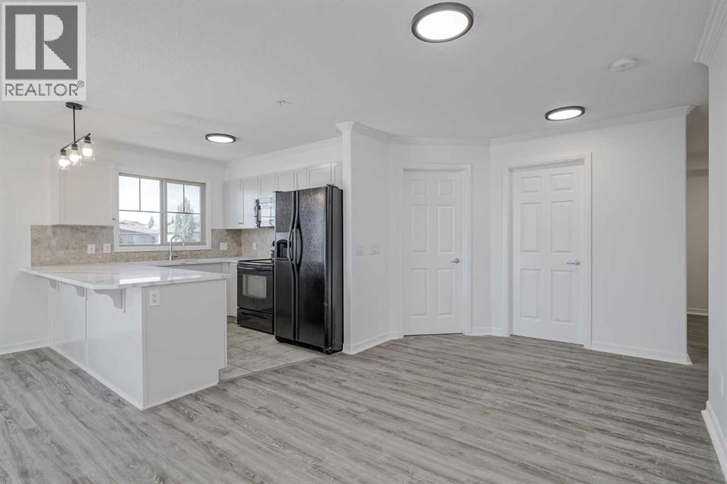 1304, 92 Crystal Shores Road, Okotoks, Alberta  T1S 2M8 - Photo 18 - A2258956
