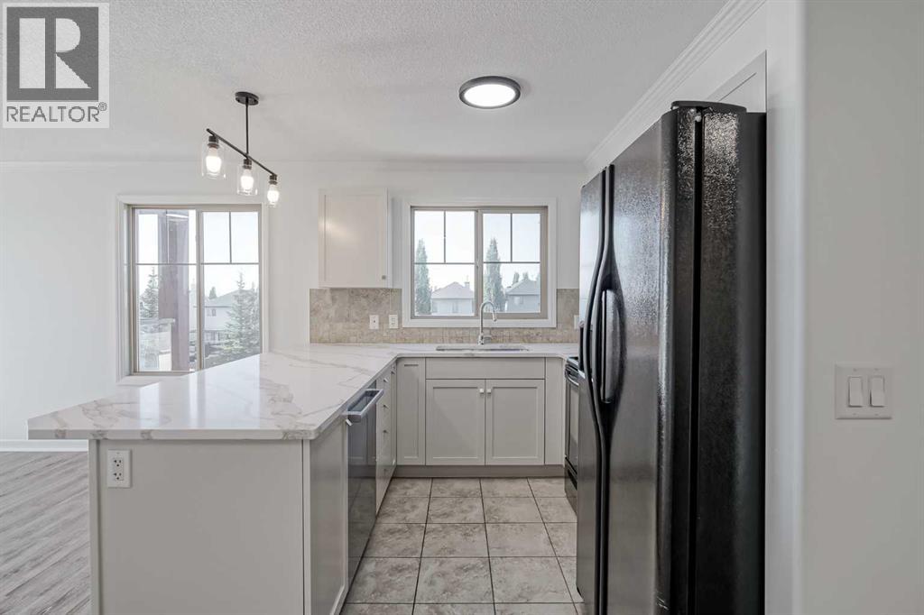 1304, 92 Crystal Shores Road, Okotoks, Alberta  T1S 2M8 - Photo 17 - A2258956