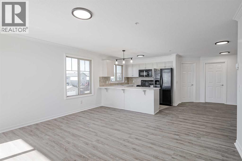 1304, 92 Crystal Shores Road, Okotoks, Alberta  T1S 2M8 - Photo 14 - A2258956