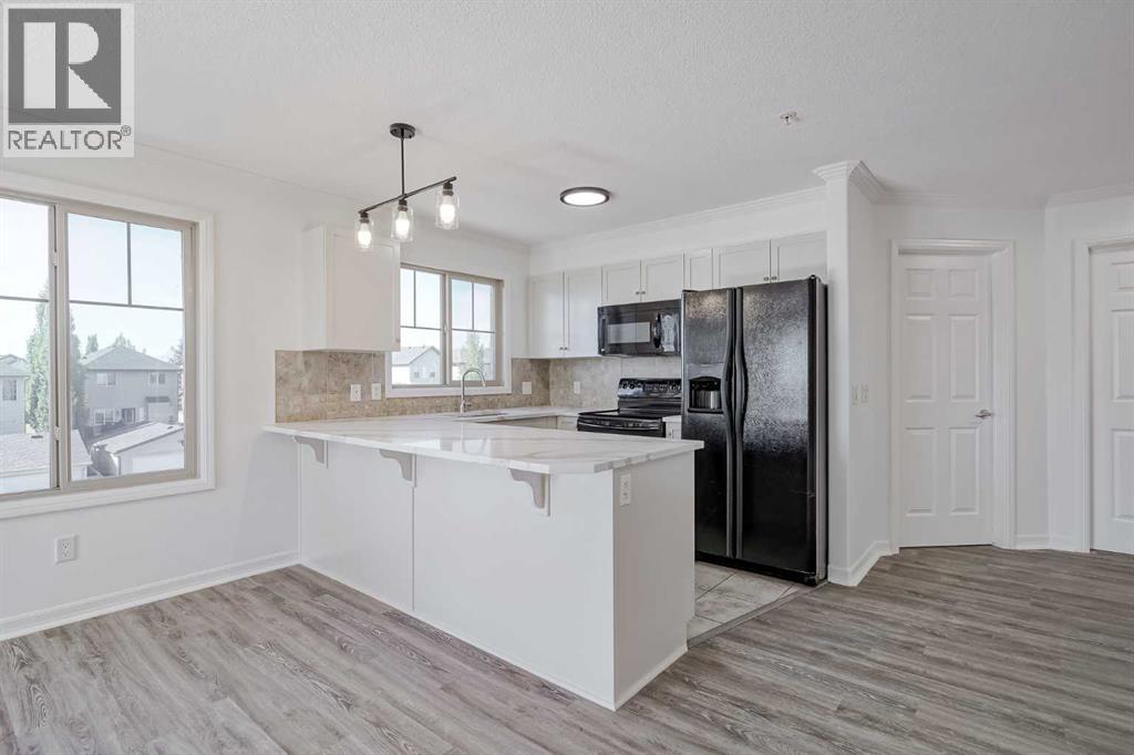 1304, 92 Crystal Shores Road, Okotoks, Alberta  T1S 2M8 - Photo 15 - A2258956