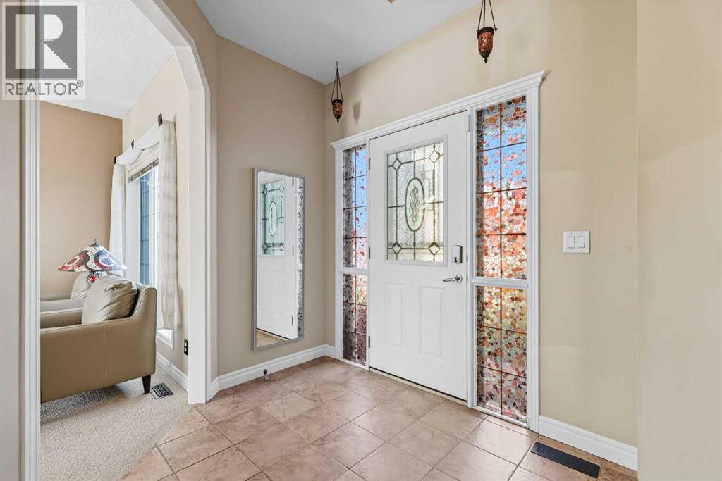 7 Panatella Close Nw, Calgary, Alberta  T3K 6B3 - Photo 4 - A2259686