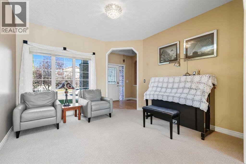 7 Panatella Close Nw, Calgary, Alberta  T3K 6B3 - Photo 6 - A2259686