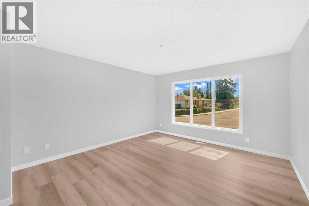 804 71 Avenue Nw, Calgary, Alberta  T2K 0N3 - Photo 8 - A2252343